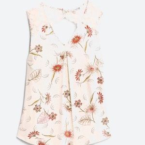 Cream colored, with burgundy and pink flower tank top